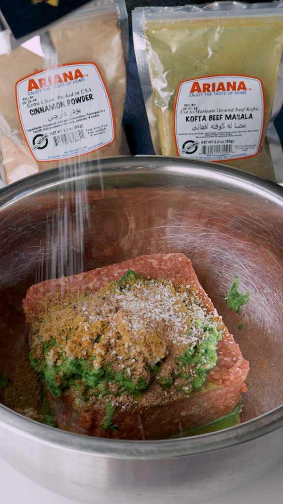 Add minced garlic, an egg, cinnamon, salt, and Ariana Sweet’s Kofta Beef Masala seasoning, and thoroughly mix together. 

Without this seasoning, add a mix of coriander, cumin, and black pepper.